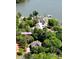 Aerial view of a waterfront property nestled among lush greenery on the shores of a serene lake at 364 Stone Cliff Ln, Clover, SC 29710
