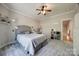 Bright bedroom with neutral tones, carpet floors, and a view into the hallway, offering a comfortable living space at 364 Stone Cliff Ln, Clover, SC 29710