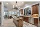 Open kitchen with granite countertops, stainless appliances, and a view of the dining and living areas at 364 Stone Cliff Ln, Clover, SC 29710