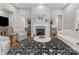 Elegant living room featuring a fireplace and hardwood floors at 4012 Moxie Way, Charlotte, NC 28215