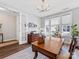Bright office with hardwood floors, large windows, and classic wood furniture at 4012 Moxie Way, Charlotte, NC 28215