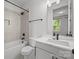 Bathroom with tub, shower, and modern fixtures, plus tiled accents at 4019 Plaza Row Ct, Charlotte, NC 28205
