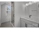 Stylish bathroom features a glass enclosed shower and modern vanity at 4019 Plaza Row Ct, Charlotte, NC 28205