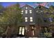 Charming townhome featuring a brick facade and large windows for ample natural light at 4019 Plaza Row Ct, Charlotte, NC 28205
