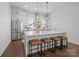 Contemporary kitchen featuring a spacious island with seating and stainless steel appliances at 4019 Plaza Row Ct, Charlotte, NC 28205