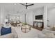 Open-concept living room showcasing a plush rug, round glass coffee table, and comfortable seating for a relaxing ambiance at 4019 Plaza Row Ct, Charlotte, NC 28205