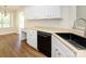 Kitchen sink and countertop with stainless steel dishwasher, ample counterspace and hard surface flooring at 4203 Ethel Sustar Dr, Monroe, NC 28110