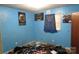 A bedroom with blue walls and 'Mandalorian' themed decor, showing potential for customization at 4814 Chapel Grove Rd, Gastonia, NC 28052