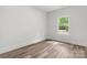 Bedroom featuring wood-look flooring and natural light from a window at 508 Clegg St, Shelby, NC 28150