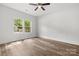Bedroom featuring wood-look flooring and natural light from a double window at 508 Clegg St, Shelby, NC 28150