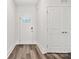 Bright entryway features new flooring, a stylish front door, and access to additional rooms at 508 Clegg St, Shelby, NC 28150