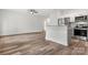 Beautiful open space living area with stainless steel appliances, new flooring, and modern finishes at 508 Clegg St, Shelby, NC 28150