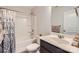 Bathroom with a shower-tub combo, white vanity, and a stylish shower curtain at 5150 Mount Clare Ln, Charlotte, NC 28210