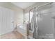 Bright bathroom showcasing a tub, shower, and tile flooring at 536 Wellbourne Nw Ct, Concord, NC 28027