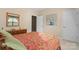 Bedroom with neutral walls, carpeted floors, and natural lighting at 536 Wellbourne Nw Ct, Concord, NC 28027