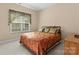Bedroom featuring neutral walls, a bright window, and carpeted floors at 536 Wellbourne Nw Ct, Concord, NC 28027