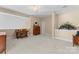 Spacious bonus room featuring neutral walls, a ceiling fan, and carpeted floors at 536 Wellbourne Nw Ct, Concord, NC 28027