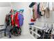 Organized walk-in closet with shelving and hanging storage for ample space at 536 Wellbourne Nw Ct, Concord, NC 28027