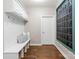 Mudroom boasts built-in storage, bench seating, and a convenient calendar at 541 Nw Sutro Forest Dr, Concord, NC 28027