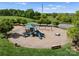 Community playground area with various play structures, providing a safe and fun environment for children to enjoy at 541 Nw Sutro Forest Dr, Concord, NC 28027