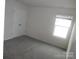 Bright bedroom with carpet flooring, a window, and double door closet at 574 30Th Avenue Ne Cir, Hickory, NC 28601