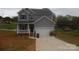 Charming two-story home featuring a well-manicured lawn and inviting front porch at 574 30Th Avenue Ne Cir, Hickory, NC 28601