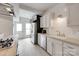 Bright updated kitchen with stainless steel appliances, white cabinetry, and lots of natural light at 5901 Quail Hollow Rd # G, Charlotte, NC 28210