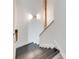 Staircase with modern railing and lighting at 5901 Quail Hollow Rd # G, Charlotte, NC 28210
