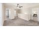 Spacious bonus room with neutral carpeting, offering versatility for a playroom, office, or additional living space at 6153 Kilchurn Dr, Fort Mill, SC 29707