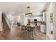 Open-concept kitchen with stainless appliances, an island, and an adjacent dining area at 6153 Kilchurn Dr, Fort Mill, SC 29707