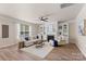 Cozy living area featuring a fireplace, built-in shelving, and a plush rug, perfect for relaxation at 6153 Kilchurn Dr, Fort Mill, SC 29707
