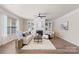Inviting living room with fireplace, built-in bookshelves, and a neutral color palette creating a cozy atmosphere at 6153 Kilchurn Dr, Fort Mill, SC 29707