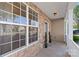 Close-up view of the stone-accented porch, featuring a stylish entrance and well-maintained surroundings at 6153 Kilchurn Dr, Fort Mill, SC 29707