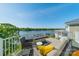 Spacious balcony with comfortable seating and panoramic views of the lake at 637 Williamson Rd # 309, Mooresville, NC 28117