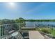 Beautiful outdoor balcony with lake view and comfortable lounge seating at 637 Williamson Rd # 309, Mooresville, NC 28117