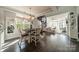 Inviting dining area open to living space with spiral staircase at 637 Williamson Rd # 309, Mooresville, NC 28117
