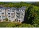 Condo with private balconies overlooking manicured lawn at 637 Williamson Rd # 309, Mooresville, NC 28117
