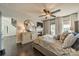 Bright primary bedroom features a fireplace, TV and balcony access at 637 Williamson Rd # 309, Mooresville, NC 28117
