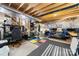 Unfinished basement with concrete floors and exposed rafters offers lots of storage space at 6702 Carradale Way, Charlotte, NC 28278