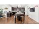 Beautiful kitchen features an island with granite countertop and stainless steel appliances at 6702 Carradale Way, Charlotte, NC 28278