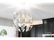 A decorative light fixture hangs from the ceiling at 6702 Carradale Way, Charlotte, NC 28278