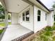Side and back of home has newly renovated porch that is partially covered and has a brick foundation at 712 N Washington St, Shelby, NC 28150