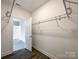 A walk-in closet with metal shelving at 712 N Washington St, Shelby, NC 28150