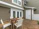 Cozy outdoor patio with seating and a serene atmosphere at 8251 Tradd Ct, Charlotte, NC 28210