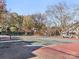Outdoor tennis court, perfect for staying active and enjoying the outdoors at 8251 Tradd Ct, Charlotte, NC 28210