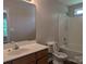 Neat bathroom featuring a vanity, toilet, and a combined tub and shower at 8332 Highlander Ct, Charlotte, NC 28269