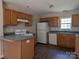 Functional kitchen featuring standard appliances and ample counter space for meal preparation at 8332 Highlander Ct, Charlotte, NC 28269