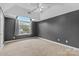 Vaulted bedroom with a large window at 9010 Davis Crossing Ct, Charlotte, NC 28269