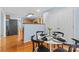 Cozy dining nook with seating for four, leading into a kitchen area at 9010 Davis Crossing Ct, Charlotte, NC 28269