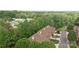Aerial view of a well-maintained home within a tree-lined neighborhood at 904 3Rd Street Ne Pl, Conover, NC 28613